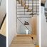 The Stylish Staircase Made of Metal Framework and Wooden Panels