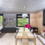 Architectureandinteriordesignofthethree storybuildinginmodernstylewithasaunaandapool