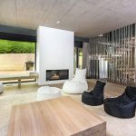 Architectureandinteriordesignofthethree storybuildinginmodernstylewithasaunaandapool