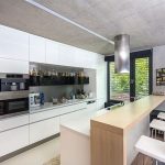 Architectureandinteriordesignofthethree storybuildinginmodernstylewithasaunaandapool