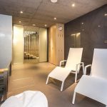 Architectureandinteriordesignofthethree storybuildinginmodernstylewithasaunaandapool