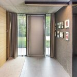 Architectureandinteriordesignofthethree storybuildinginmodernstylewithasaunaandapool