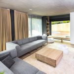 Architectureandinteriordesignofthethree storybuildinginmodernstylewithasaunaandapool