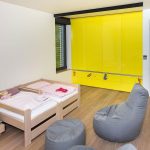 Architectureandinteriordesignofthethree storybuildinginmodernstylewithasaunaandapool