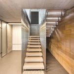 Architectureandinteriordesignofthethree storybuildinginmodernstylewithasaunaandapool