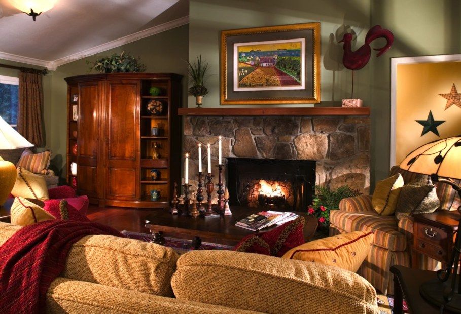 Decorate the zone around the fireplace with paintings the wall and portal