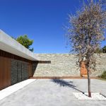 The shining “Plane House” residence on the Greek island