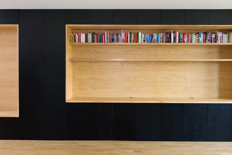 Youth Apartment in Ljubljana by Arhitektura doo studio - Home library