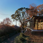 The house is on top of a ridge in Japan