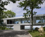 Glass Clearhouse by Stuart Parr Design on the lake bank