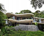 The glass house Planchonella in the tropical forest from Jesse Bennett Architect