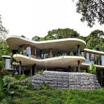 The glass house Planchonella in the tropical forest from Jesse Bennett Architect